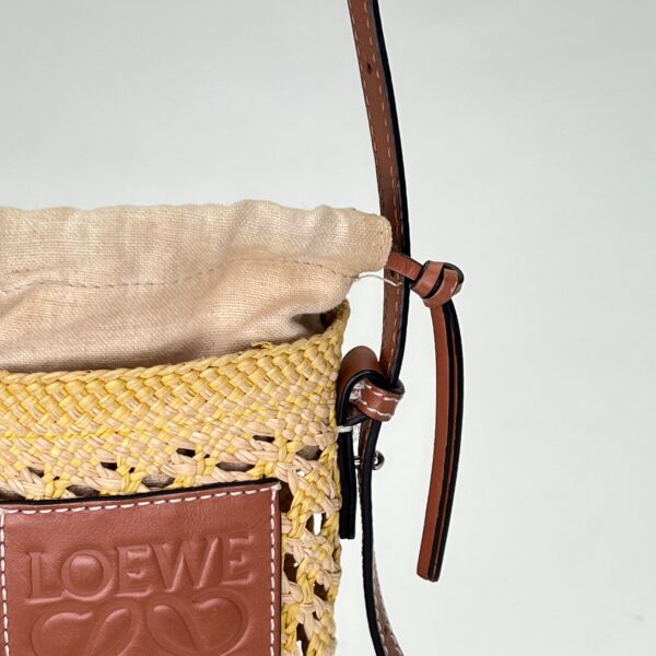 Cylinder Pouch Brown Crossbody Bag in Raffia - Image 8